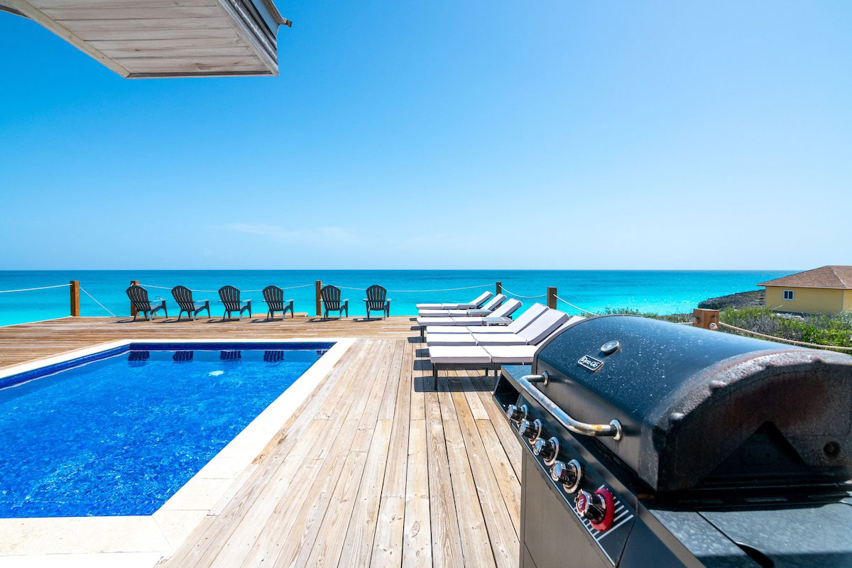 Indigo House Pool Deck Pool Deck at Indigo House Exuma overlooking the ocean.